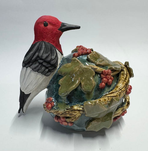 Hand Sculpted Ceramic Red Headed Woodpecker Bird Sitting on Orb of Branches Leaves & Berries