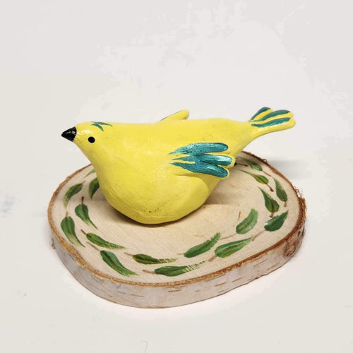 Hand Sculpted Hand Painted Stoneware Yellow Bird Figurine on Birch Round
